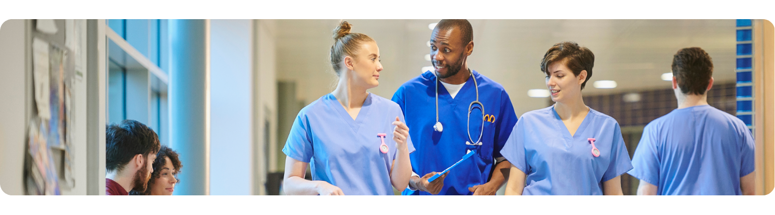 Nurses talking in corridor