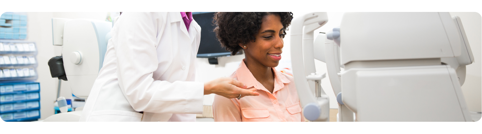 Optometrist carrying out eye test