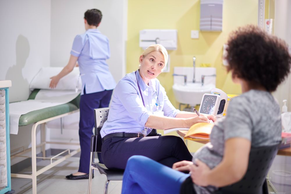womens health - female patient at doctors appointment